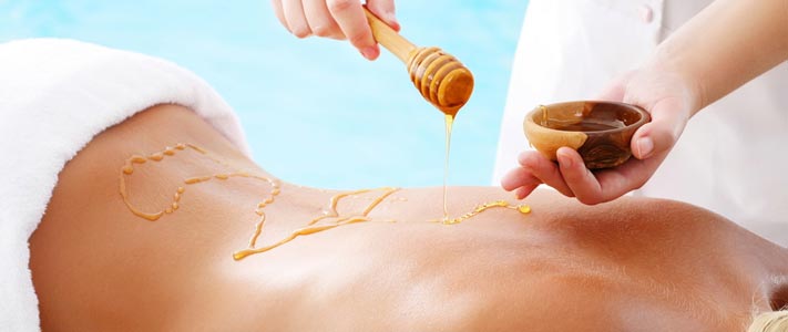 Медовый массаж тела (спины, живота) в салоне красоты